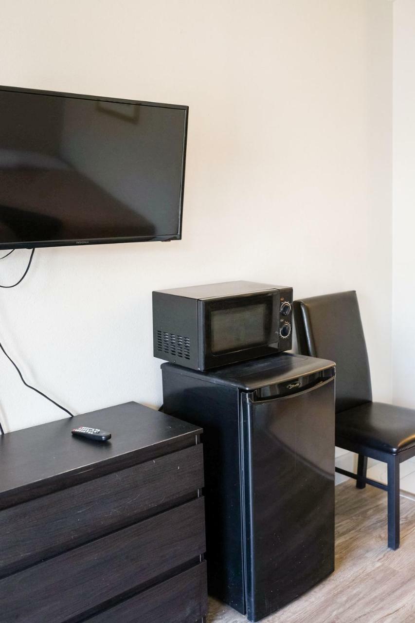 بومونت Merit Inn And Suites الغرفة الصورة